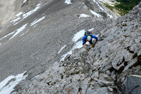 Phil ascends the first cliff band.