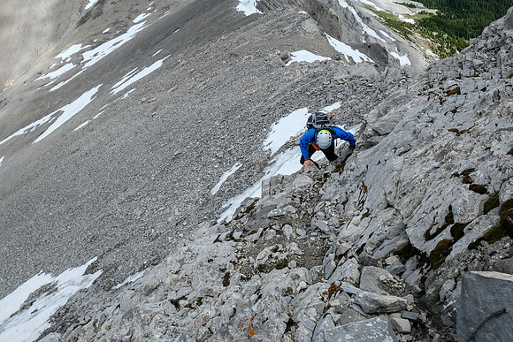 Phil ascends the first cliff band.