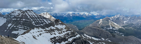 Phil is tiny on the west ridge as we traverse to the outlier between Baril and Cornwell.