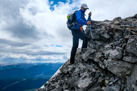 Ascending a small cliffband to the summit block.