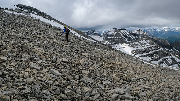 Racing bad weather to the summit.