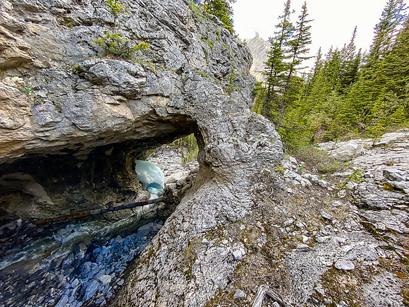 ... only to discover this amazing cave, carved through the rock!