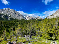 Views to Fording Pass and Baril Peak (L) from a lookout along the approach.
