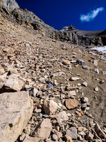 The summit rises far above - we cut left here.