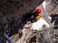 Downclimbing the crux.