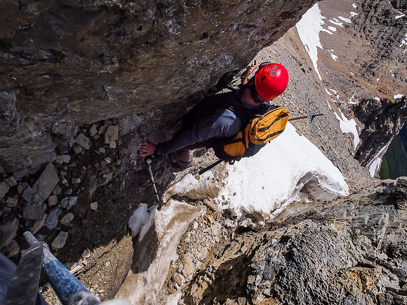 Downclimbing the crux.