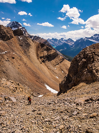 Back down scree off the ridge to the summit.
