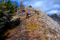 Hiking up the muddy trail on the lower SE ridge of Smutwood.
