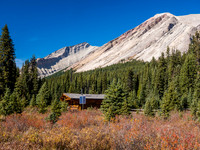 The warden cabin near Red Deer Lake with Cyclone (L) and Pipestone (R) rising above.