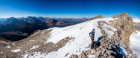 Looking along the impressive east face of Pipestone towards the summit from the false summit.