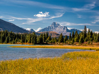 Mount Hector rises over the largest of the Red Deer lakes.
