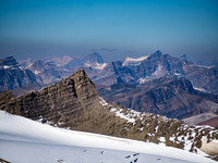 The clear, early morning air allows views to faraway peaks such as The Lyells at distant left and Chephren at distant right.
