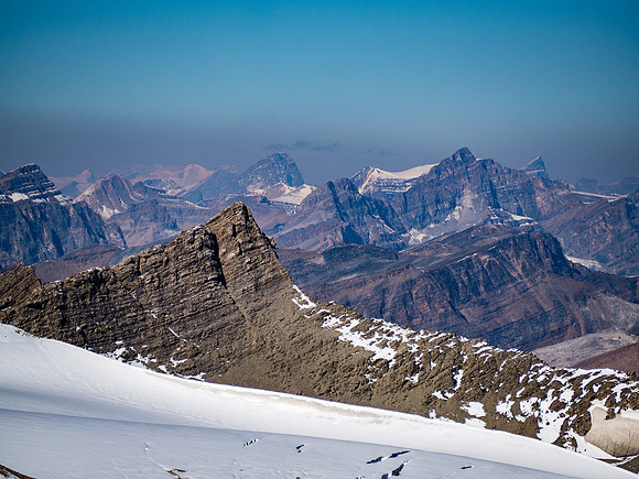 The clear, early morning air allows views to faraway peaks such as The Lyells at distant left and Chephren at distant right.