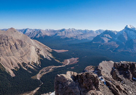 Looking past Mount Douglas (R) towards the Sawback Range and distant peaks such as Gable and Barrier in the Ya Ha Tinda region of the front ranges.