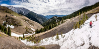 Looking back as Hann crosses the avy slope / gully along the approach road on Junction Hill's east aspect.