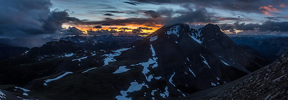 The last hints of a dying day come to a brilliant close as we continue down slope to Fatigue Pass with Fatigue Mountain and its eastern summit in front of us.