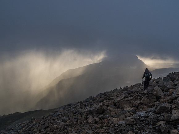 Dramatic back lighting on the storm from the setting sun over Citadel Peak.