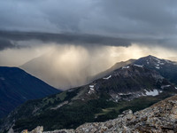Dramatic back lighting on the storm from the setting sun over Citadel Peak.