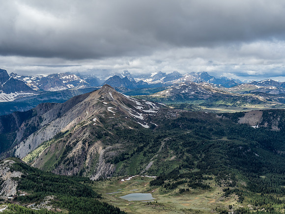 Looking north over Quartz Hill towards the Egypt Lakes with Pharaoh Peak visible and Mount Ball in clouds beyond.