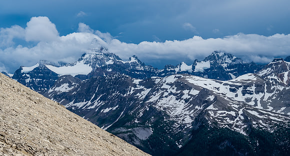 As the cloud cap thickened over Assiniboine, I snapped this last shot of her summit before it socked in again. The Marshall at distant right here.