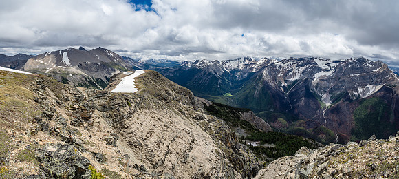 Fantastic views down the south ridge of Citadel, deep into the Simpson River Valley at right with Policeman's Meadows brilliant green at center.