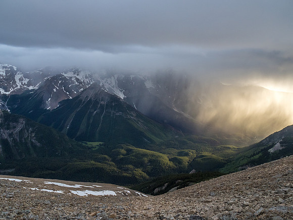 Dramatic back lighting on the storm from the setting sun over Citadel Peak.