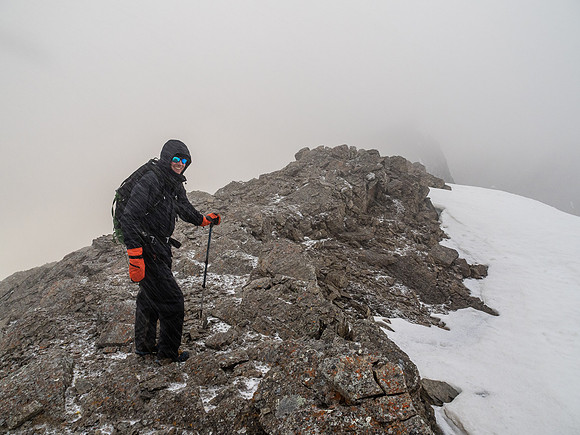 Phil is all smiles despite a snow storm at the end of June at 21:30 high on the Continental Divide.