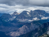 Looking across the recent burn area towards The Monarch which is buried in clouds.