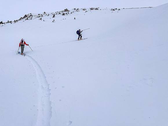 Skiing to the south ridge via the south gully.