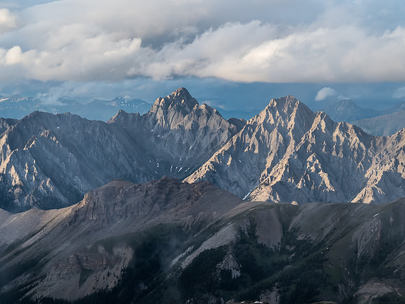 Setting sun highlights the jagged ridges on peaks in the Sundance Range. Good thing not too many of these peaks are named because they don't look easy!