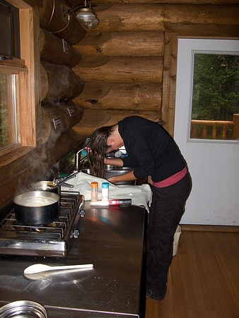 Hanneke washes her hair in the sink of the cook house. Don't tell anyone!