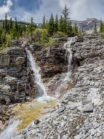 Twin waterfalls in the creek - still looking grey towards the summit high above.