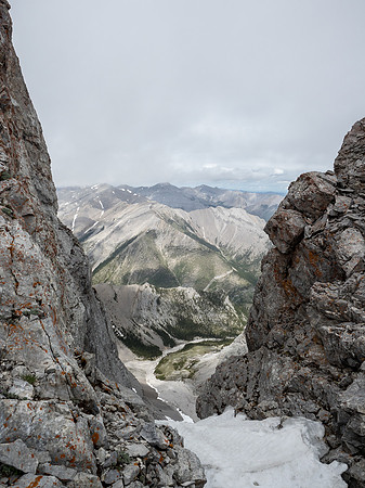 Peering north through a gap in the pinnacles on the upper ridge.