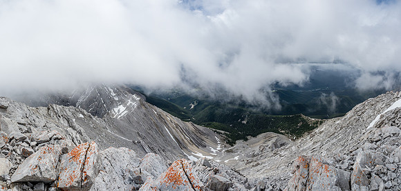 Extremely limited views looking south (L) and west (C) off the summit.