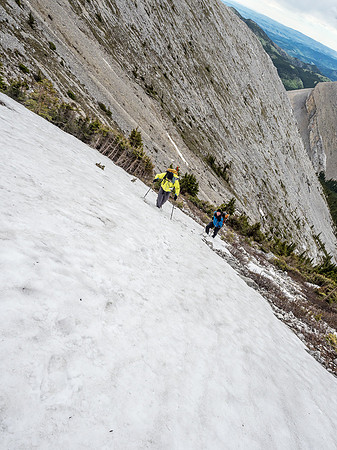 Taking advantage of a short snow slope just above the tree island to avoid some scree bashing.