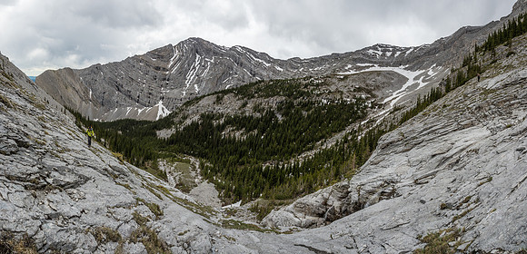 A slightly wider shot looking down the drainage at center with Wietse coming up at left and Kev at right.