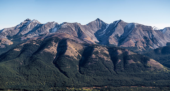 Lying just to the east of Odlum Ridge is the impressive Highwood Peak (C-R) with equally impressive unnamed summits at left and an impressively shaped Junction Mountain just visible at distant right.