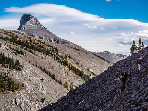 Traversing high on Claw Creek's south bank with Devil's Head watching over our progress.
