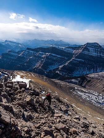 Trevor approaches the summit in brutal wind gusts.