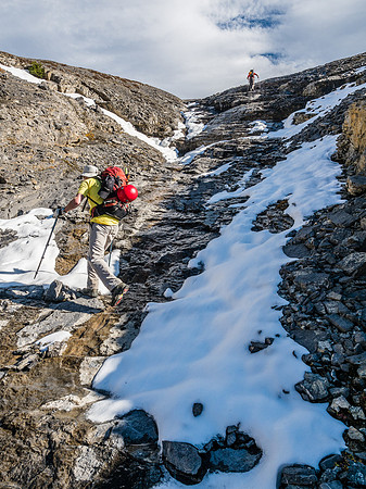 The running water finally decides to turn to ice as we work our way up in a shallow gully.