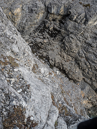 Looking straight down into Claw Creek from the crux wall we ascended.