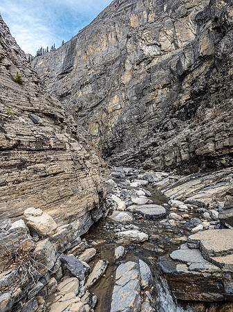 Trevor searches for a way around the crux waterfall.