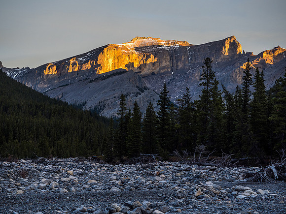 The very impressive south aspect of Castle Rock with the summit catching early morning sun.
