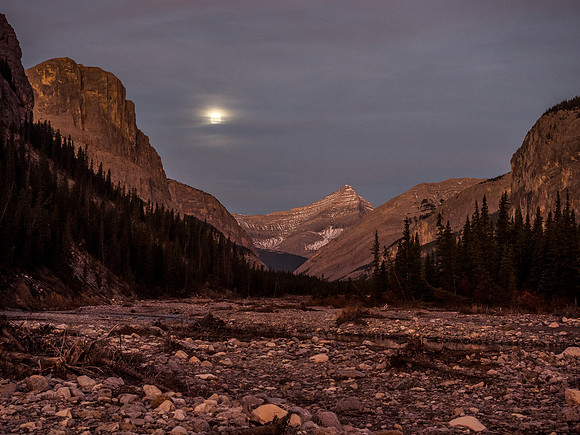 The moon rises over Mount Aylmer.