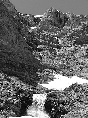Many waterfalls in the upper bowl, feeding into the Kananaskis River far below.
