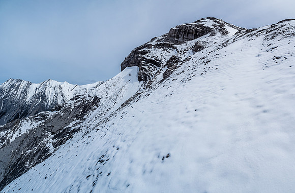 Looking up to the col and ascent slope to the summit ridge.