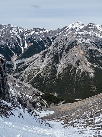 Looking all the way back down the access gully to Cougar Creek. Charles Stewart South in the bg.