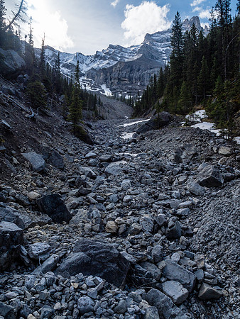 Up the mankiest part of the access gully, looking forward to the peak rising above us at distant upper left here.