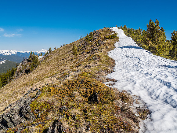 The final slopes to the top show the western side completely melted off.]