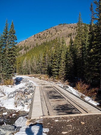 Crossing Etherington Creek on a bridge along the approach road, E-B Ridge rising in the distance looking dry on the lower section at least.